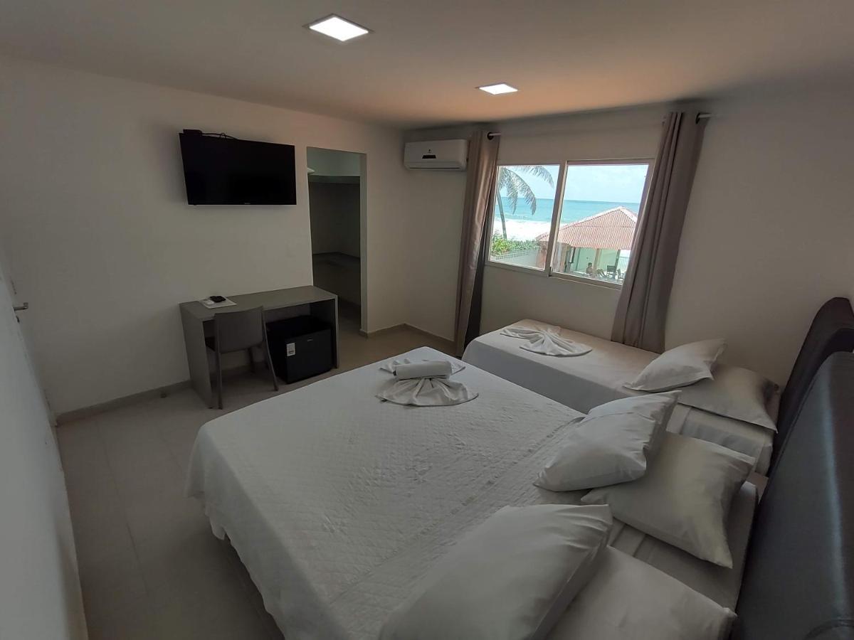 Quarto Triplo com Vista Mar