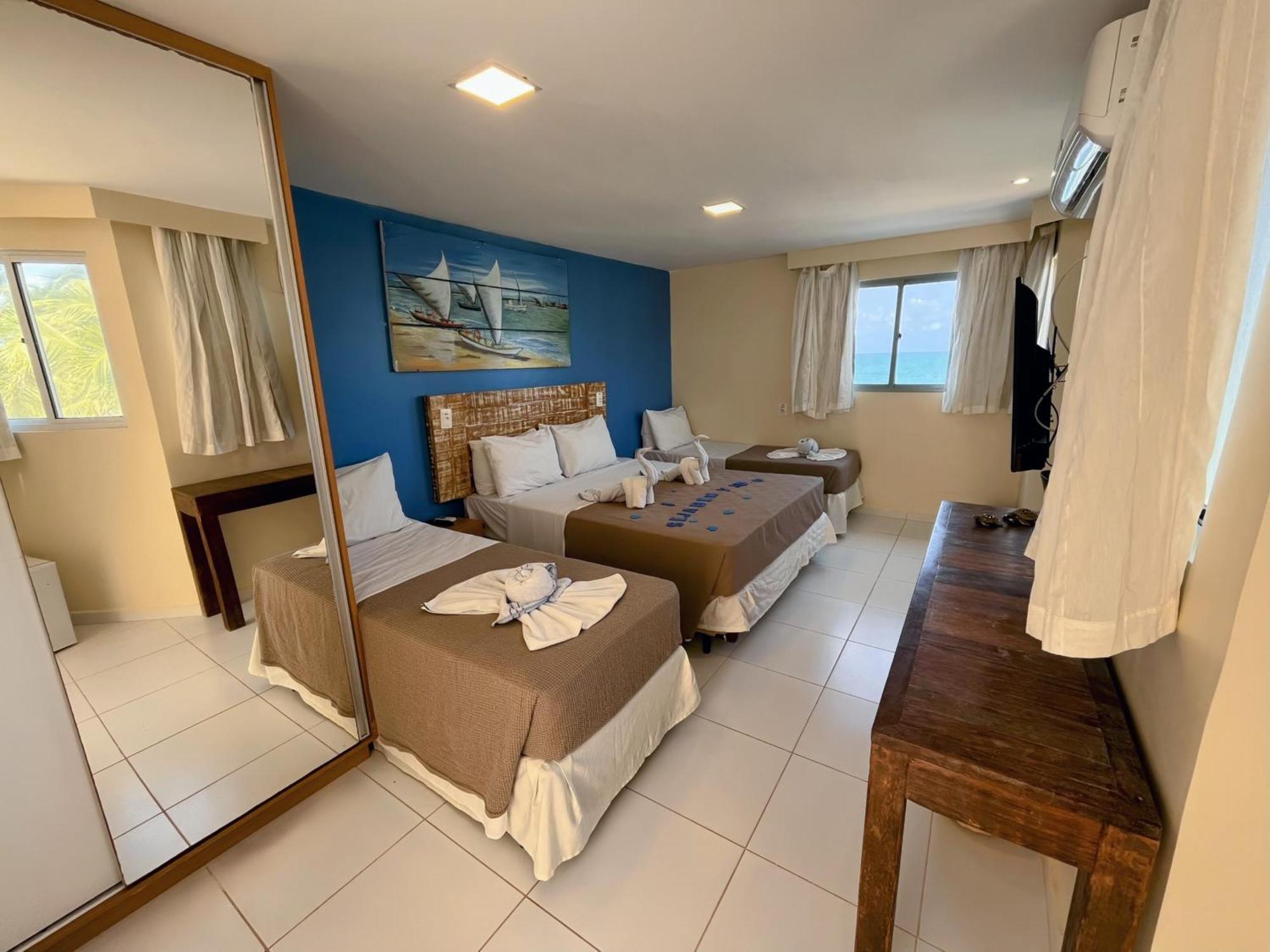 Quarto Quádruplo com Vista Mar